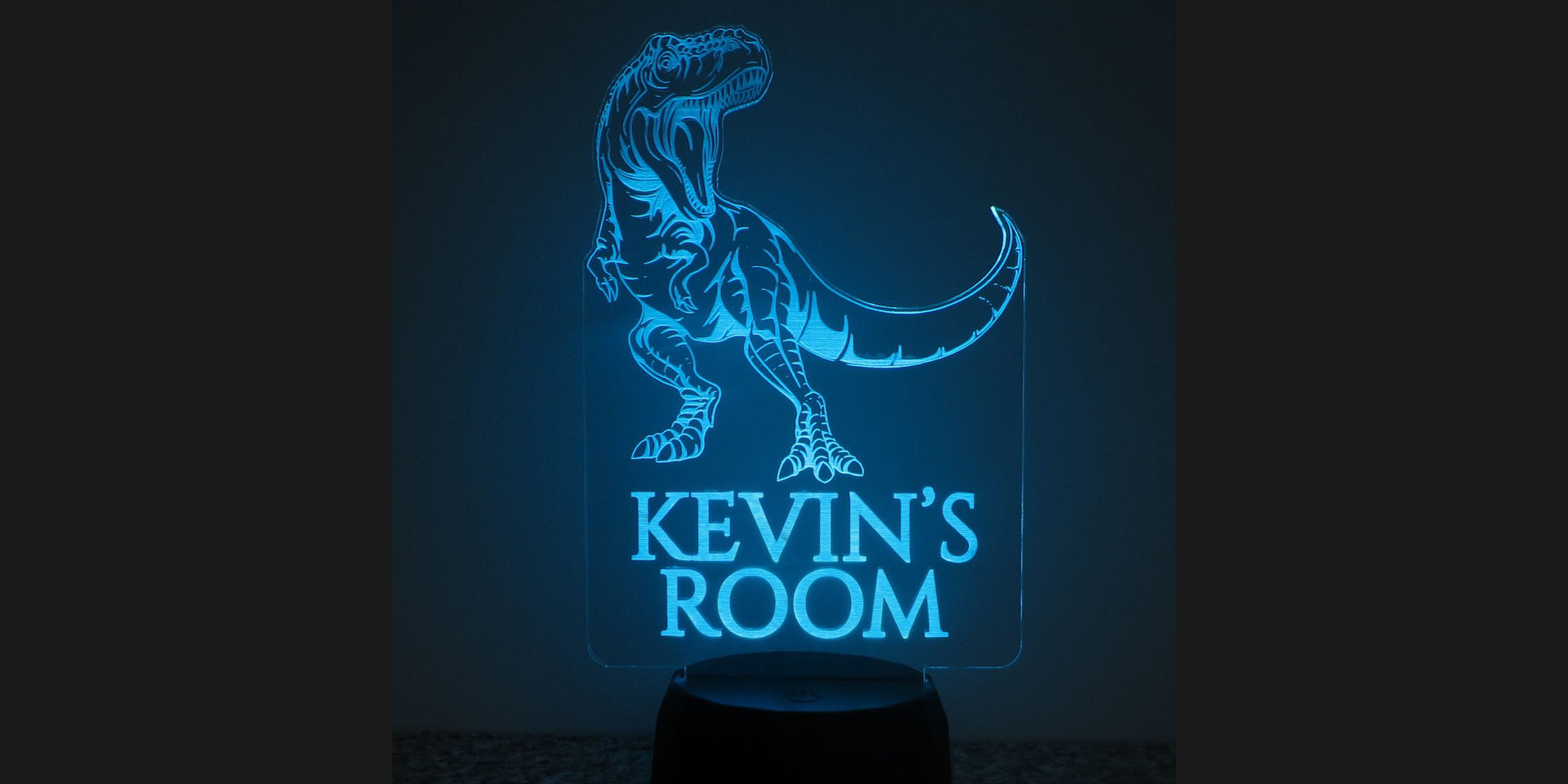 Load video: Watch the changing colors of the T-rex LED night light.
